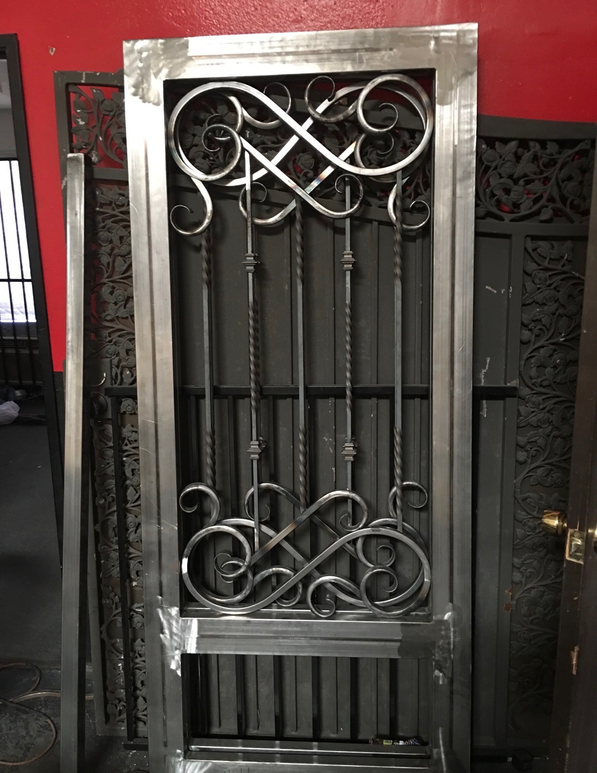 Hand-forged iron security door with twisted balusters