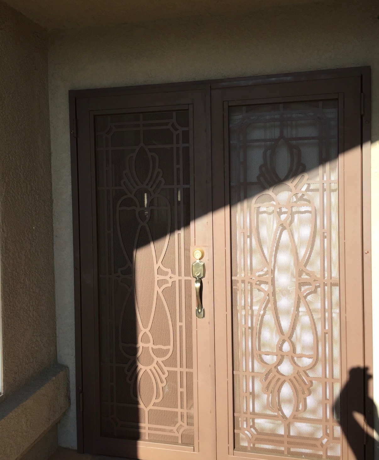 Ornamental iron double security screen doors